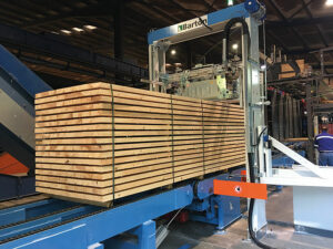 Automatic strapping lines for sawmills