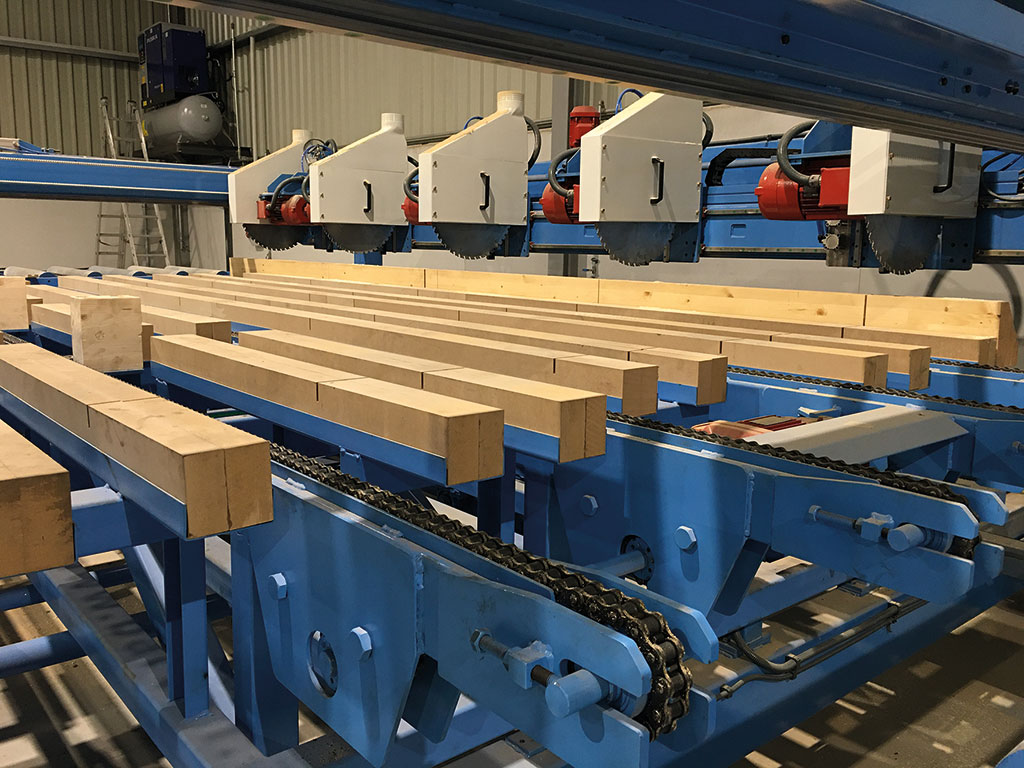 Trimmers for sawmills